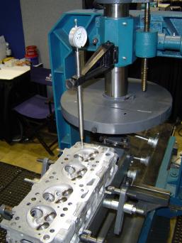 Illustrative example of cylinder head resurfacing machine from Google Search