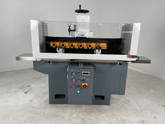 Illustrative example of cylinder head resurfacing machine from Google Search