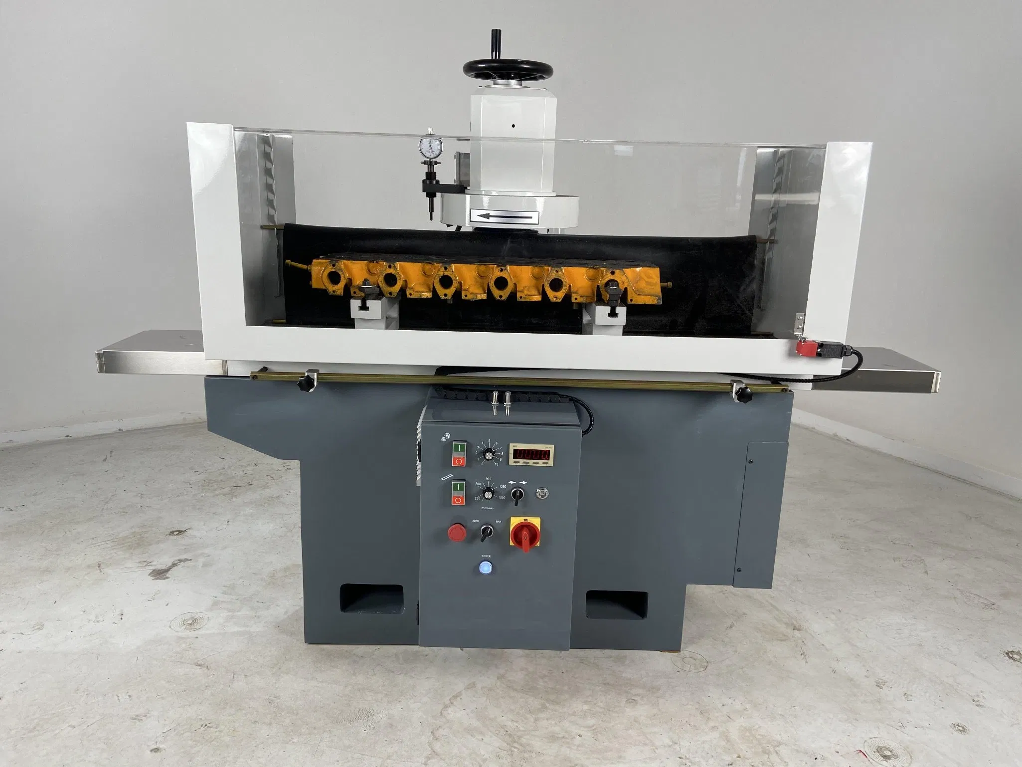 Illustrative example of cylinder head resurfacing machine from Google Search