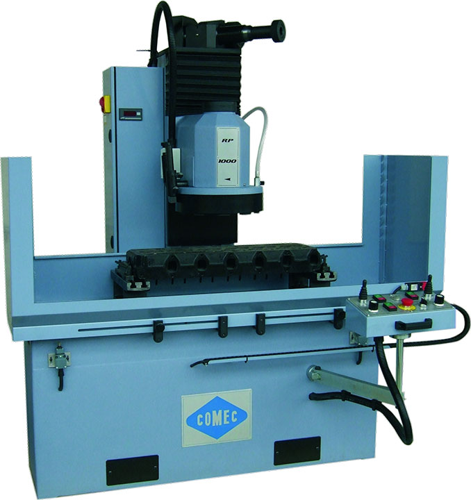 Illustrative example of cylinder head resurfacing machine from Google Search