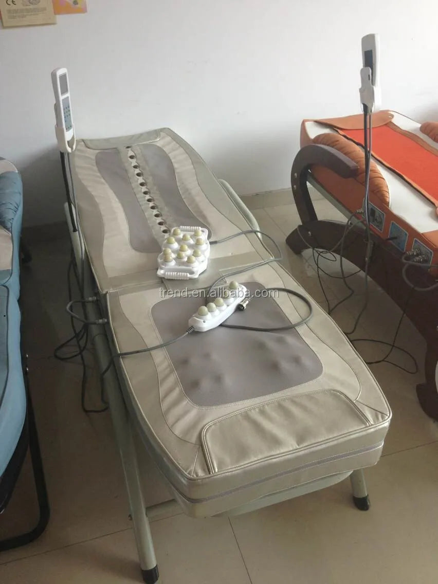 Illustrative example of massage bed with rollers from Google Search