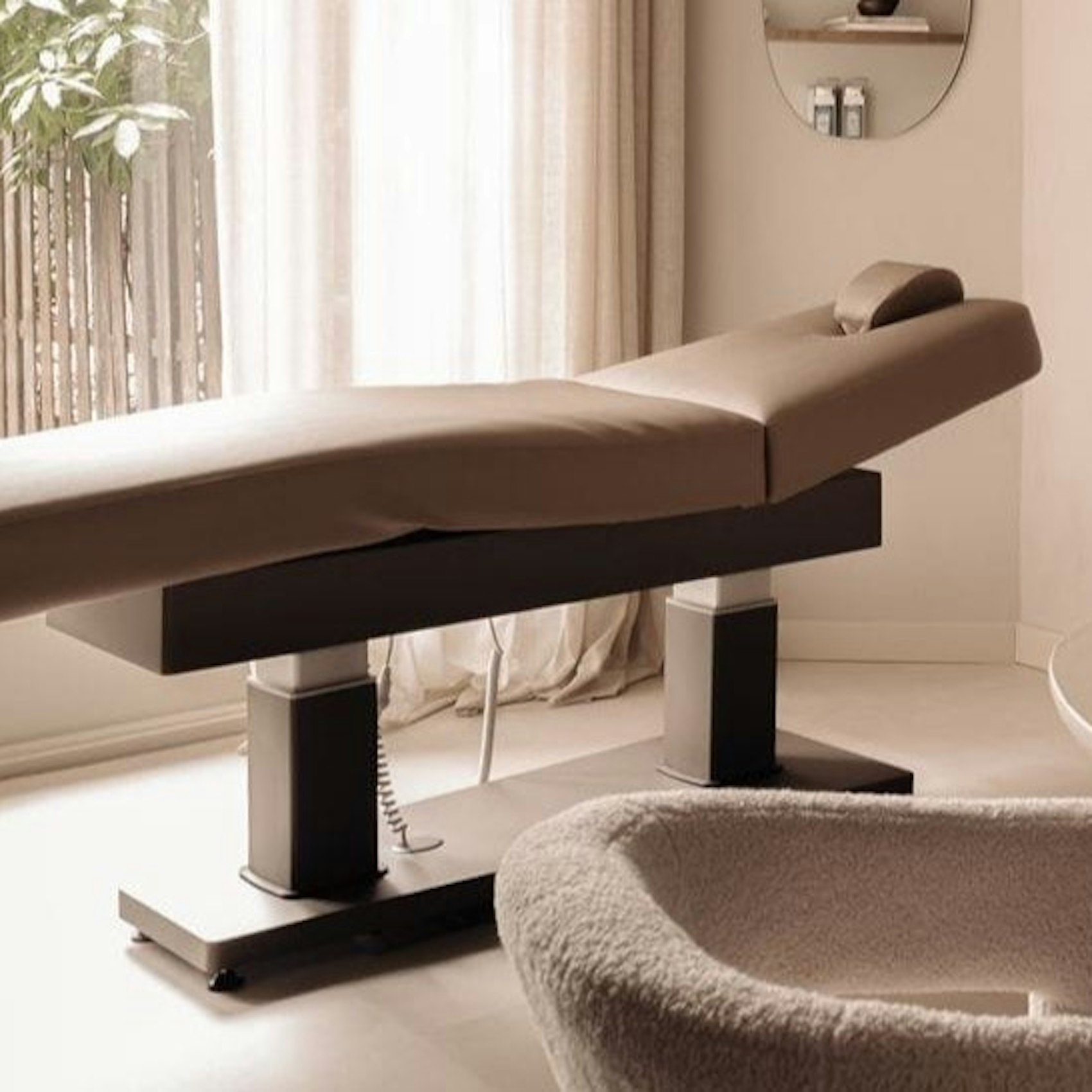 Illustrative example of massage bed with rollers from Google Search