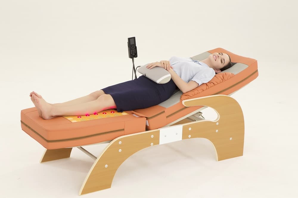Illustrative example of massage bed with rollers from Google Search
