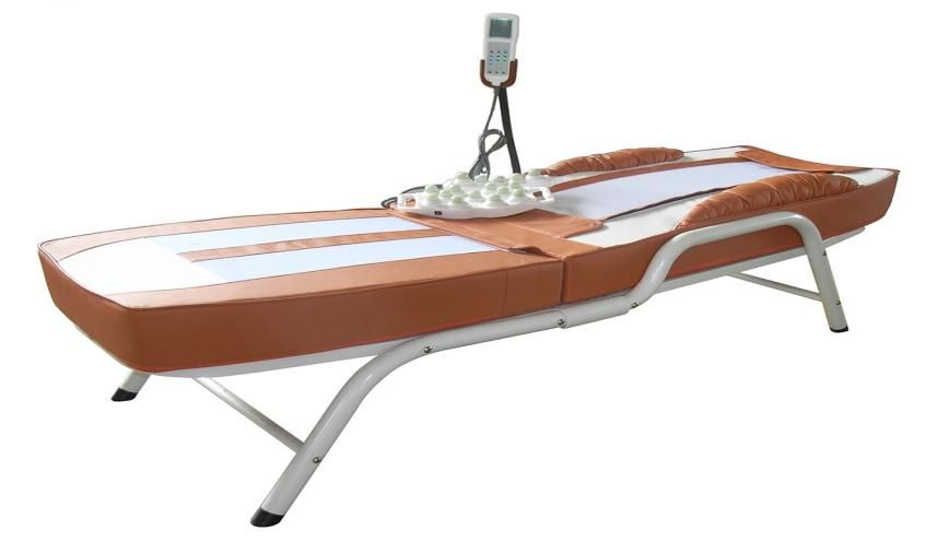 Illustrative example of massage bed with rollers from Google Search